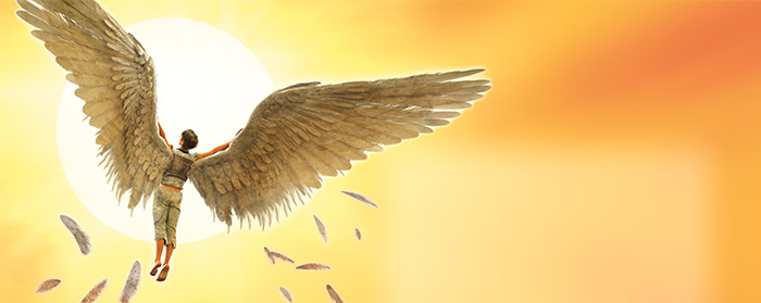 A man with wings flies toward the sun