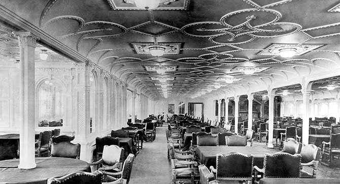 A black and white photo of a fancy dining hall