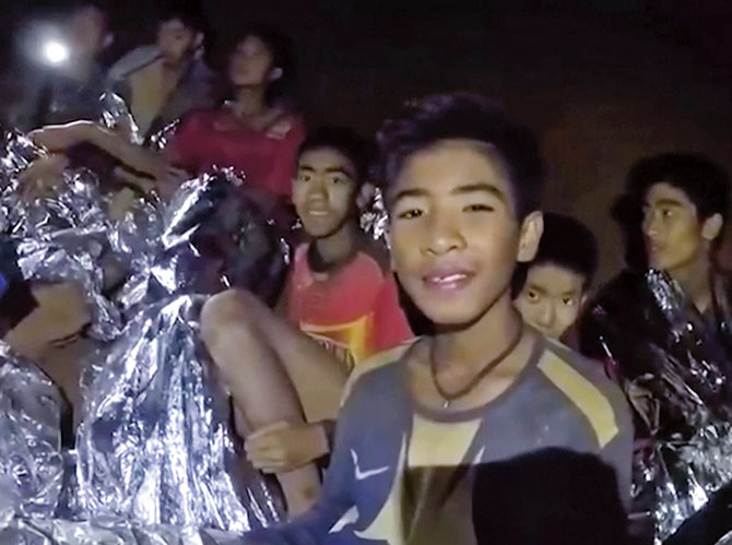 The boys discovered alive and well as some put on silver blankets meant to keep them warm
