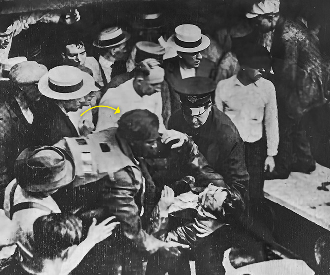 Enlargeable black & white photo of Garrett Morgan rescuing a man from a tunnel