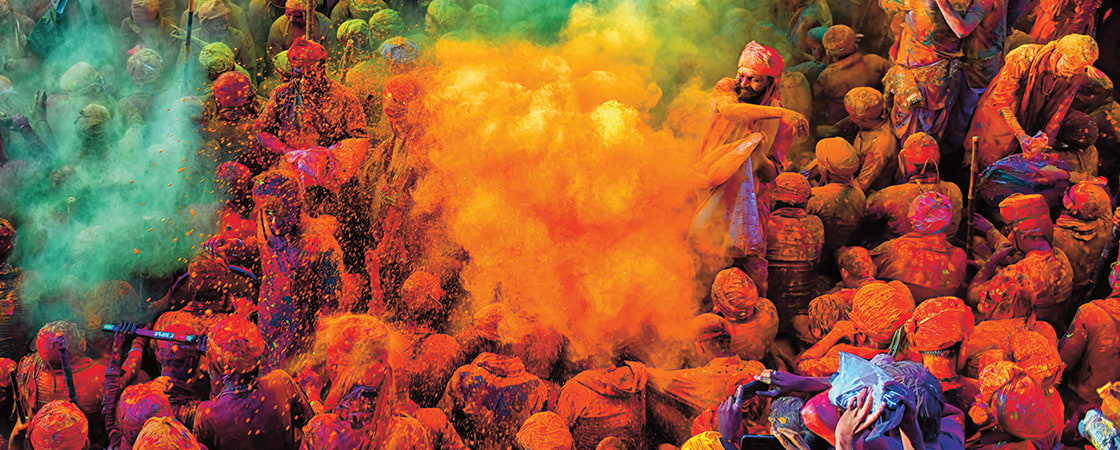 Bird&apos;s eye view of people celebrating Holi