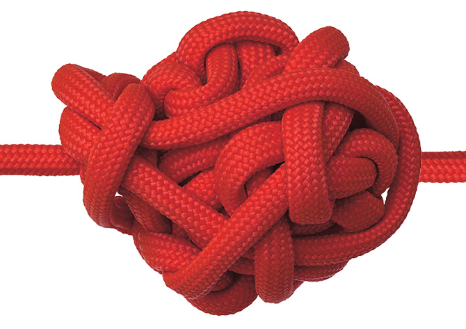 Image of red string tied in a huge knot