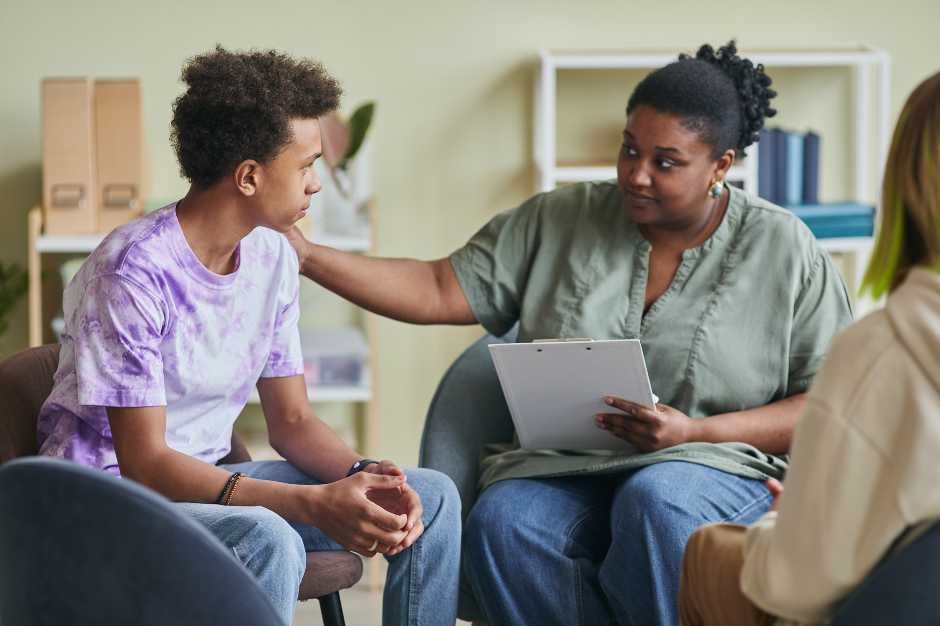 Illustration of a counselor providing emotional support for a student