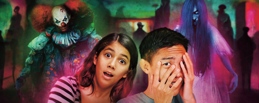 Two scared teens with scary characters in the background