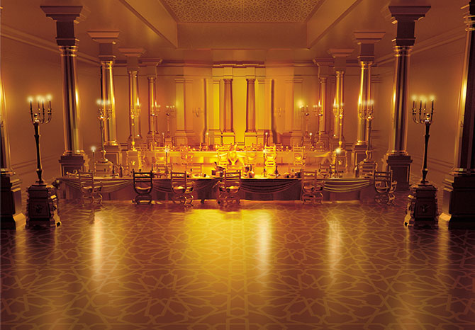 expandable illustration of a dining room where everything is made of gold