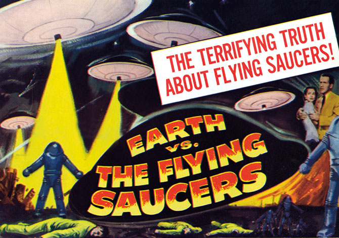 Movie poster with UFOs in the sky as a couple watches and the text: Earth vs. The Flying Saucers